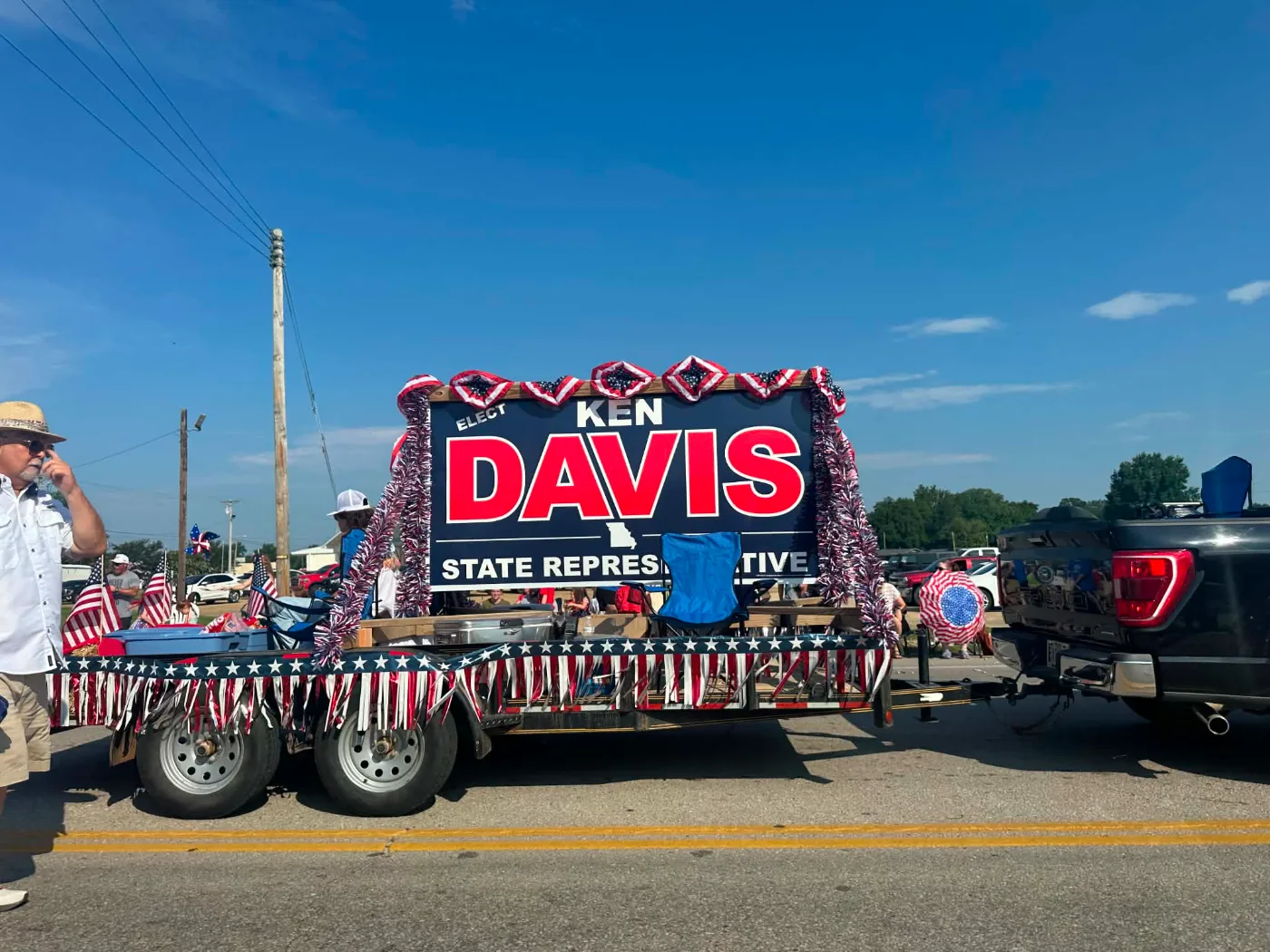 The Elect Ken Davis parade float decorated in red, white, and blue